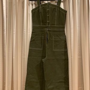 Green jumpsuit. Just tried once .